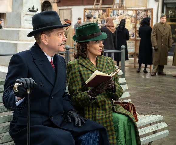 <p>Rob Youngson/20th Century Studios</p> Kenneth Branagh as Hercule Poirot and Tina Fey as Ariadne Oliver in 20th Century Studios' A HAUNTING IN VENICE