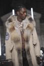 Rapper Young Thug walks in the Philipp Plein fashion show, Monday, Feb. 13, 2017, in New York. (AP Photo/Diane Bondareff)