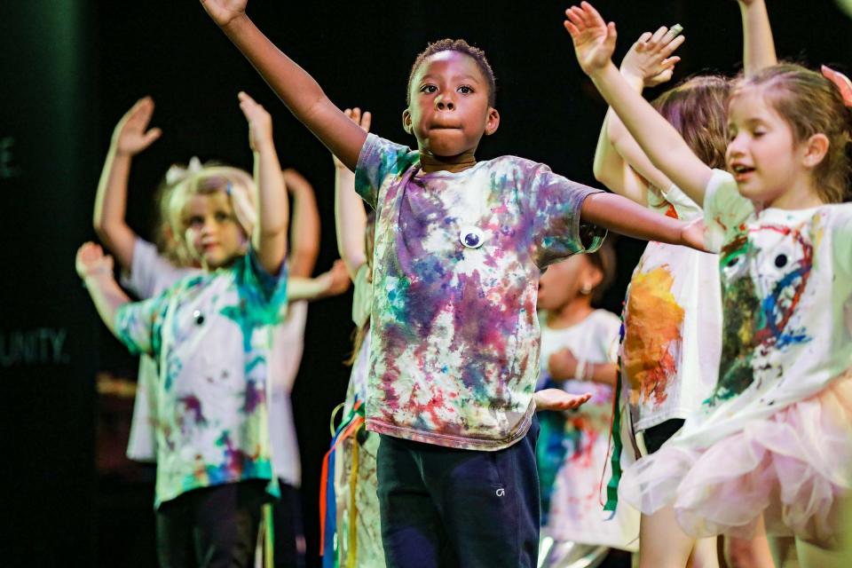 Jarod Rodwan, 7, of Detroit performs with his Creative Thinkers and Movers dance class, while he looks to Joori Jung for direction during the Artlab J dance recital at Marygrove Theatre in Detroit on June 9, 2023.