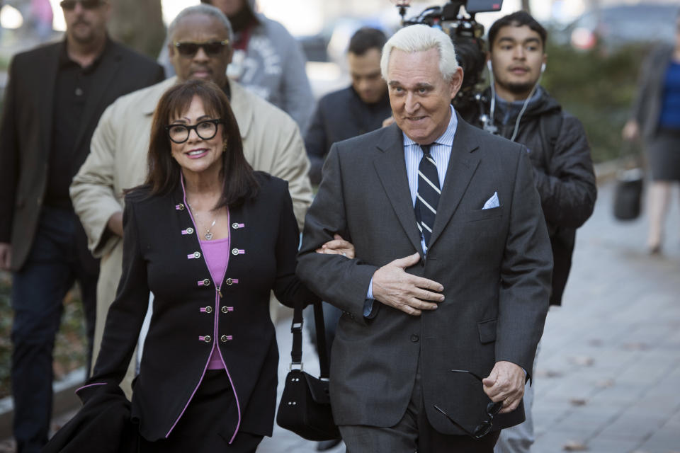 Roger Stone and his wife Nydia arrive at Federal Court for the second day of jury selection for his federal trial, in Washington, Wednesday, Nov. 6, 2019. Stone, a longtime Republican provocateur and former confidant of President Donald Trump, goes on trial over charges related to his alleged efforts to exploit the Russian-hacked Hillary Clinton emails for political gain. (AP Photo/Cliff Owen)