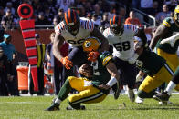 Chicago Bears defensive end Akiem Hicks sacks Green Bay Packers quarterback Aaron Rodgers as inside linebacker Roquan Smith watches during the second half of an NFL football game Sunday, Oct. 17, 2021, in Chicago. (AP Photo/David Banks)