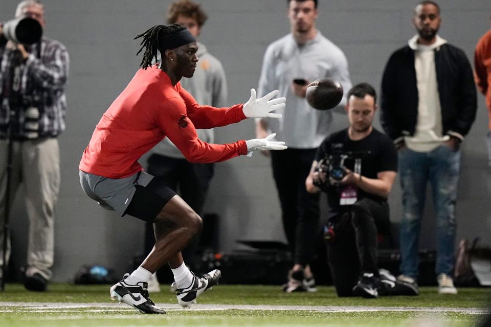 Ohio State Buckeyes wide receiver Marvin Harrison Jr. catches passes from quarterback C.J. Stroud during Ohio State football’s pro day at the Woody Hayes Athletic Center in Columbus on March 22, 2023. 