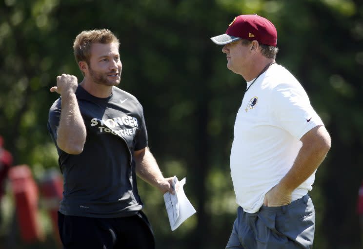 Sean McVay (left) talks to Jay Gruden at Redskins practice. (AP)