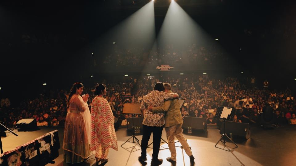 Mano giving Charan a hug after he could not control his emotions during the final song. — Mr. Graphics Studio for Mojo Projects