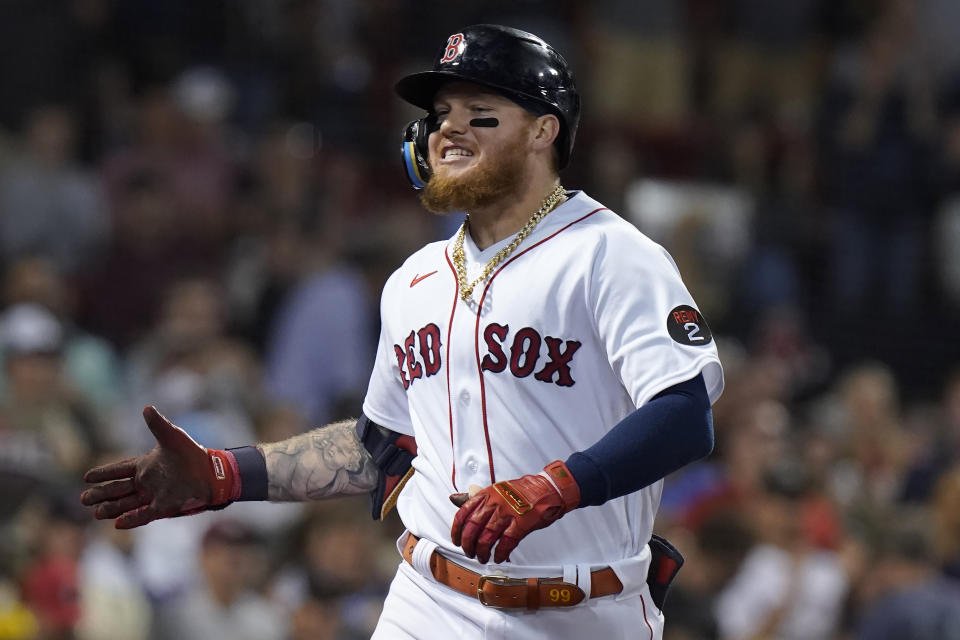 Boston Red Sox's Alex Verdugo celebrates after his home run as he makes his way to the dugout in the sixth inning of a baseball game against the Texas Rangers, Thursday, Sept. 1, 2022, in Boston. (AP Photo/Steven Senne)