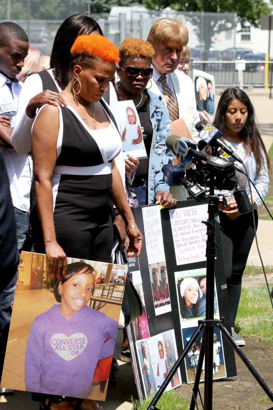 Carol Bennett holds a photo of her daughter Abbiegail Smith outside State Superior Court in Freehold Friday, May 31, 2019 Andreas Erazo was earlier sentenced to a life prison term for the murder of the 11-year-old girl in Keansburg. 