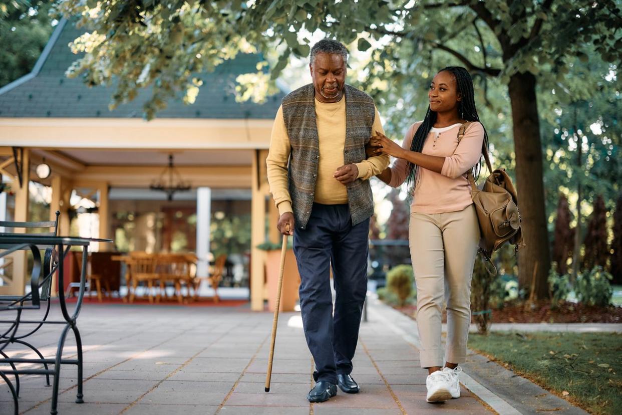 senior man with walking cane