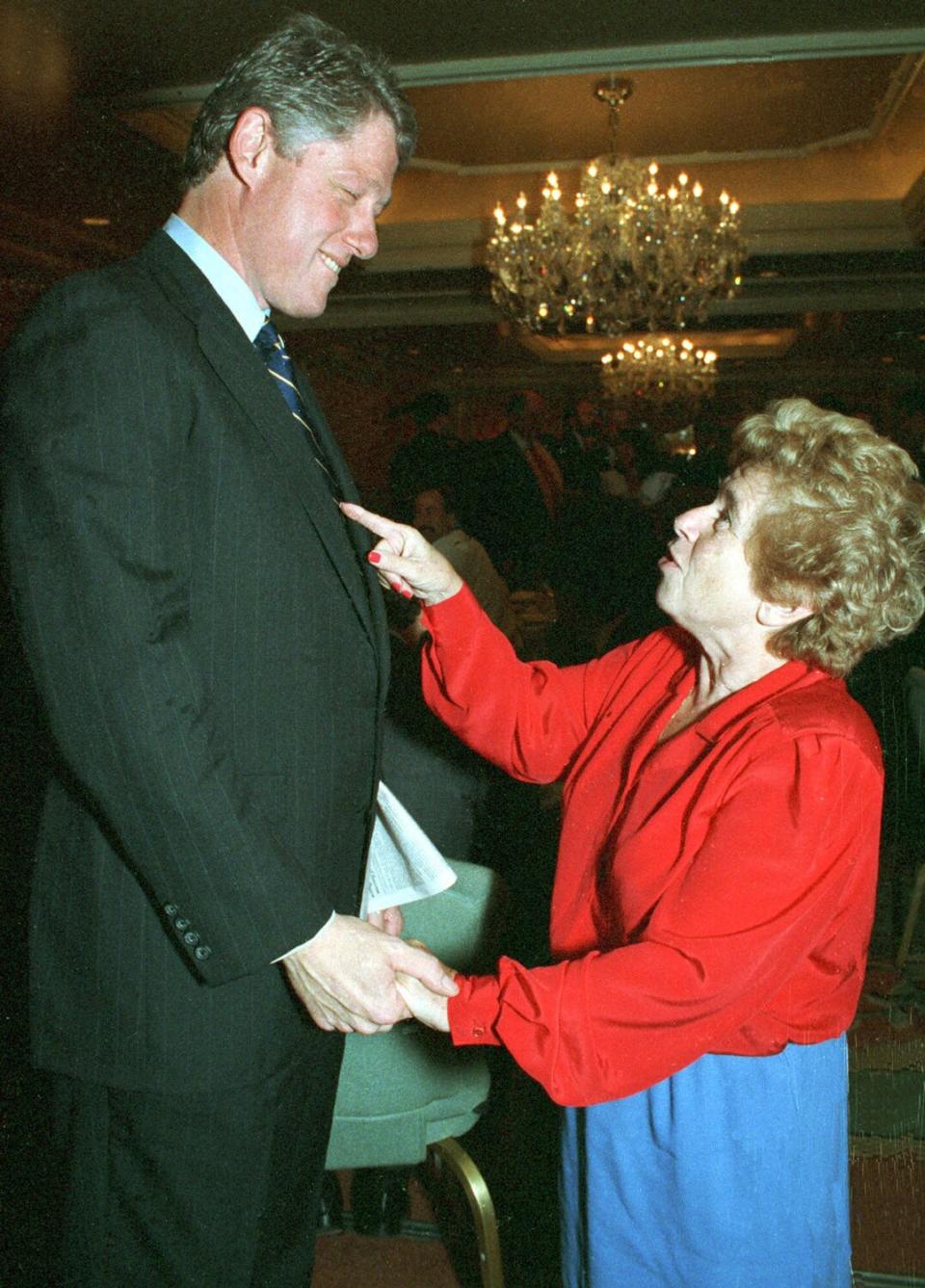 Democratic presidential hopeful, Arkansas Gov. Bill Clinton meets Dr. Ruth Westheimer Oct. 25,1991 a a New York Leadership Conference breakfast at New York's Regency Hotel.