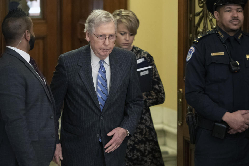 Senate Majority Leader Mitch McConnell, R-Ky., walks out of the Senate chamber during the impeachment trial of President Donald Trump at the Capitol, Friday Jan 24, 2020, in Washington. (AP Photo/Steve Helber)