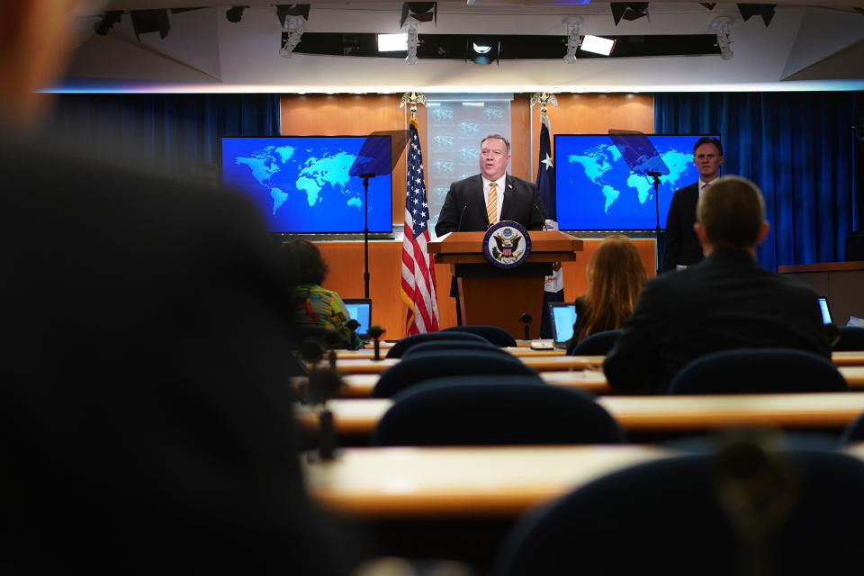 Secretary of State Mike Pompeo speaks during a press conference at the State Department, Wednesday, June 24, 2020 in Washington, as State Department Coordinator for Counterterrorism, Ambassador Nathan Sales, right, look on. (Mandel Ngan/Pool via AP)
