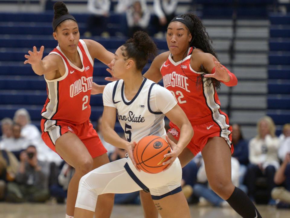 Ohio State's Taylor Thierry, left, and Cotie McMahon helped force 27 turnovers, 14 in the first half, in Thursday's win over Penn State.