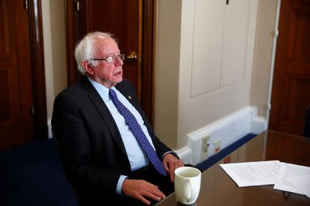U.S. Sen. Bernie Sanders (I-VT) is interviewed by Reuters reporters at his office on Capitol Hill in Washington, U.S. October 17, 2017. REUTERS/Eric Thayer