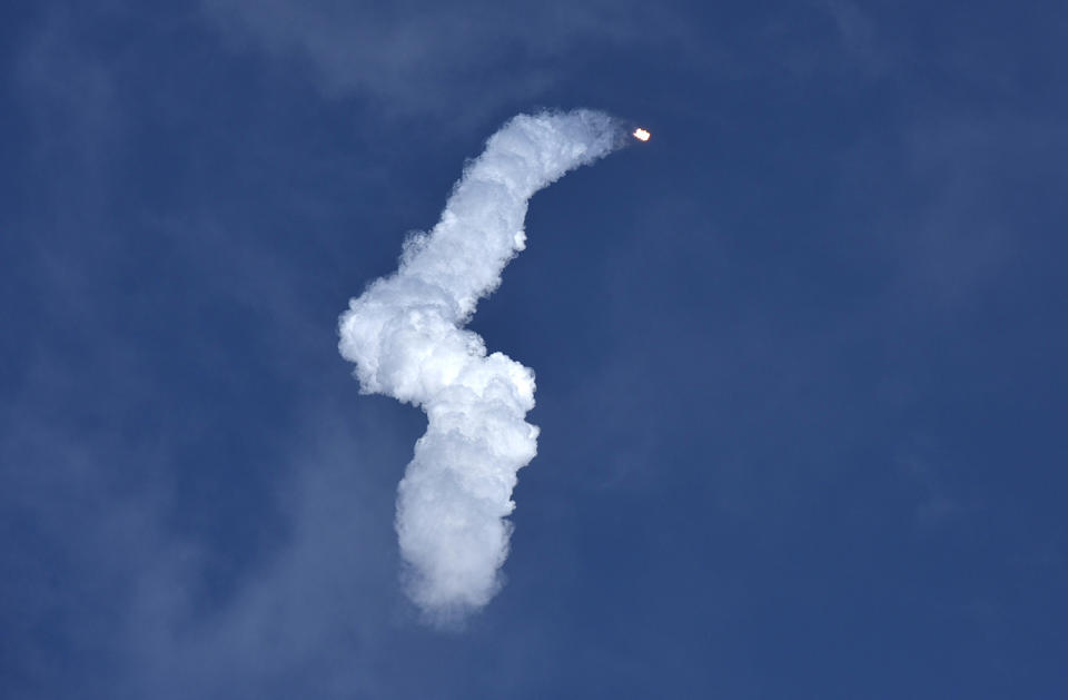 <p>A SpaceX Falcon Heavy rocket leaves a smoke trail behind after lifting off from historic launch pad 39-A at the Kennedy Space Center in Cape Canaveral, Fla., Feb. 6, 2018. (Photo: Steve Nesius/Reuters) </p>