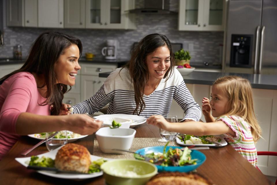 Keeping meals simple and featuring raw foods can ease the pressure. <a href="https://www.shutterstock.com/image-photo/female-gay-couple-daughter-having-dinner-411224575" rel="nofollow noopener" target="_blank" data-ylk="slk:Shutterstock;elm:context_link;itc:0;sec:content-canvas" class="link ">Shutterstock</a>