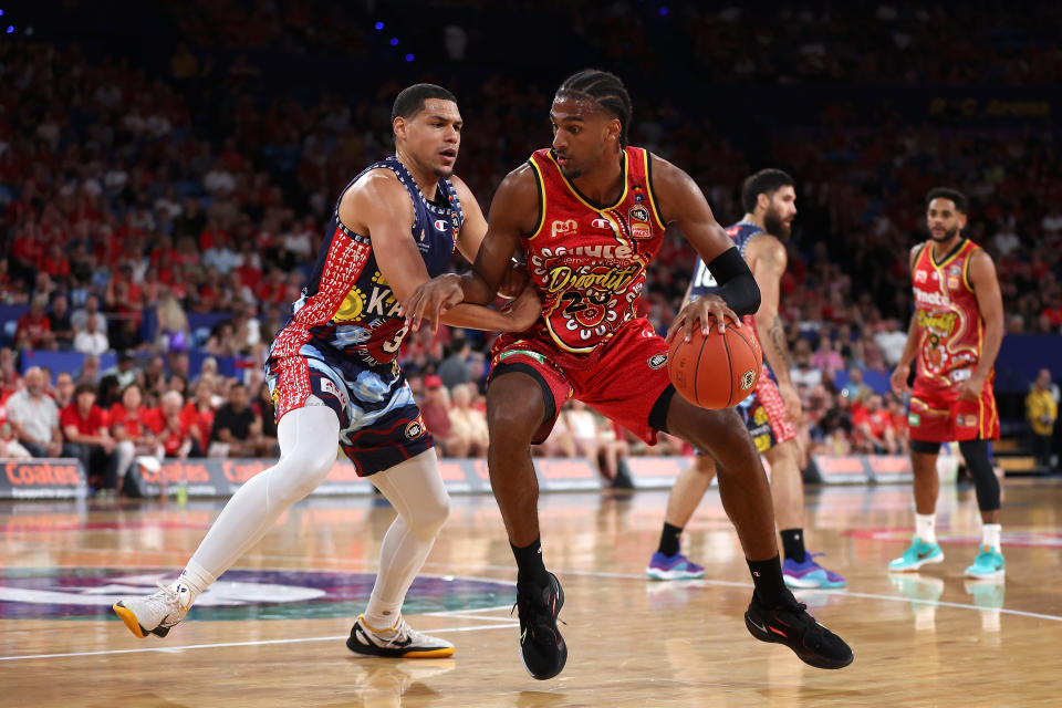 Perth's Alex Sarr controls the ball against Trey Kell of the 36ers during an NBL game on Nov. 4, 2023, in Perth, Australia. (Photo by Paul Kane/Getty Images)