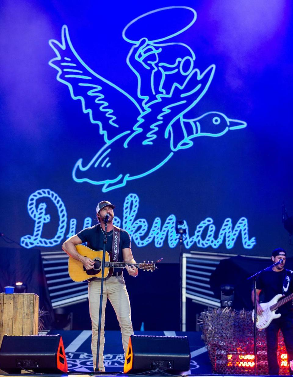 Riley Green plays to a packed Bank of America Stadium in front of his Duckman logo on Saturday, July 15, 2023.