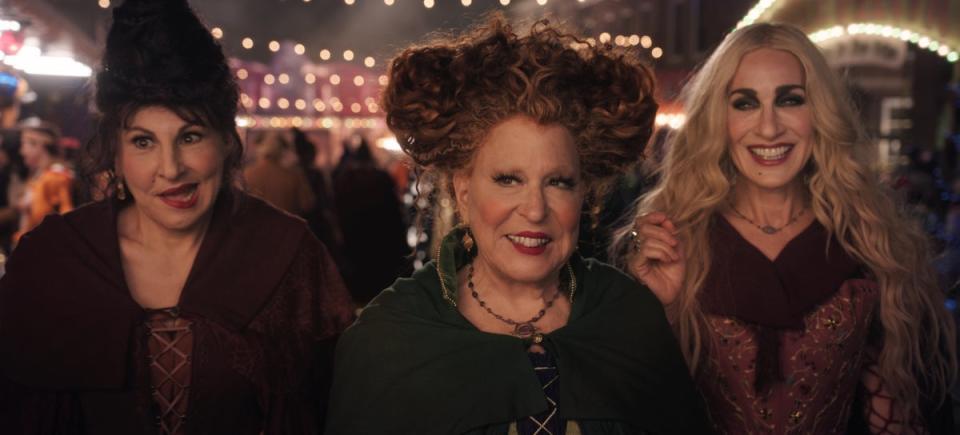 Parker (R) joins Bette Midler and Kathy Najimy in the sequel as the Sanderson Sisters (Courtesy of Disney Enterprises © 2022 Disney Enterprises, Inc. All Rights Reserved.)