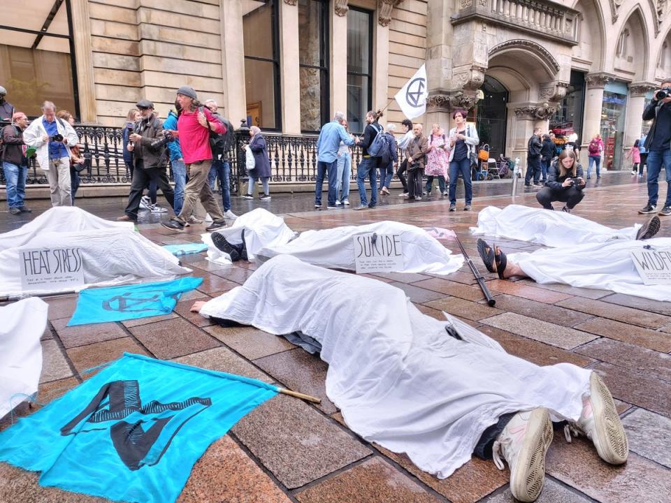 Extinction Rebellion protesters staged a ‘die in’ on Glasgow’s Buchanan Street following the heatwave. (Extinction Rebellion Scotland)