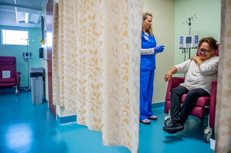 Betty Dailey receives treatment for Immune thrombocytopenia (ITP) from Sheri Palomba, RN., at the Specialty Care Center at the Tuba City Regional Health Care Corporation. (Photograph by Mary F. Calvert)