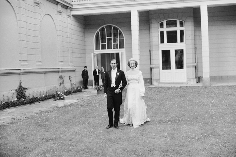 <p>Prince Michael of Kent (Queen Elizabeth's cousin) marries Baroness Christine von Reibnitz in the Town Hall in Vienna. Here, they pose for pictures outside the British Embassy. Also this year, Princess Margaret divorces Tony Armstrong-Jones.</p>