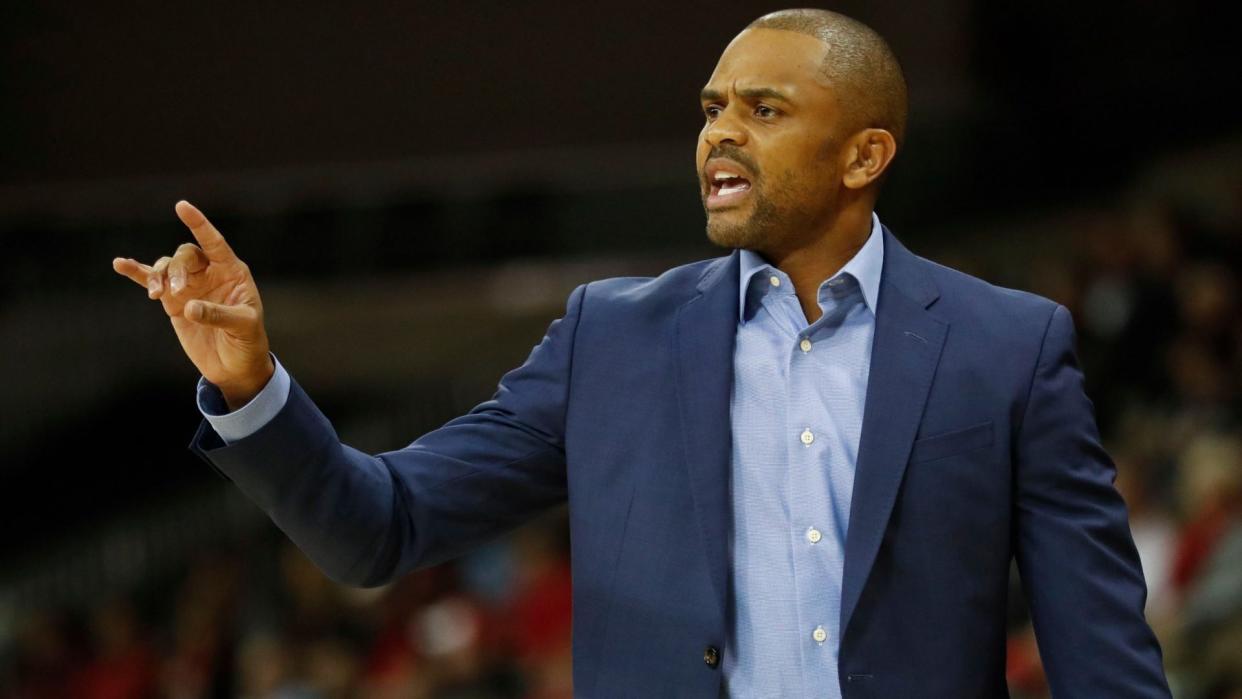 Mandatory Credit: Photo by AP/Shutterstock (9226043g)Coppin State's head coach Juan Dixon works the bench in the first half of an NCAA college basketball game against Cincinnati, in Cincinnati.