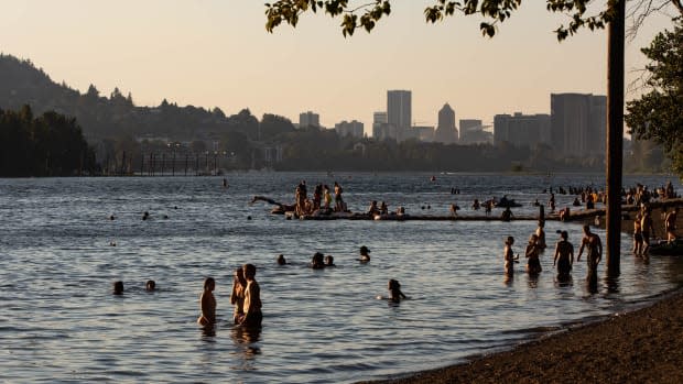 <p>Portland residents cool off at Sellwood Riverfront Park during a heat wave on Monday, June 28, 2021. Photo: Maranie Staab/Bloomberg via Getty Images</p>