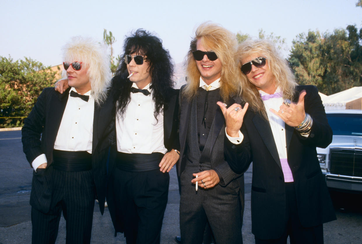 Poison's C.C. DeVille, Bobby Dall, Rikki Rockett and Bret Michaels at the 1987 MTV Music Video Awards. (Photo: George Rose/Getty Images)