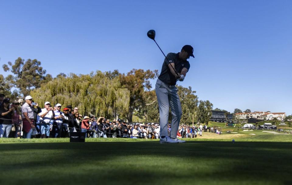 Jordan Spieth tees off on the ninth hole during the first round of the Genesis Invitational at Riviera Country Club.