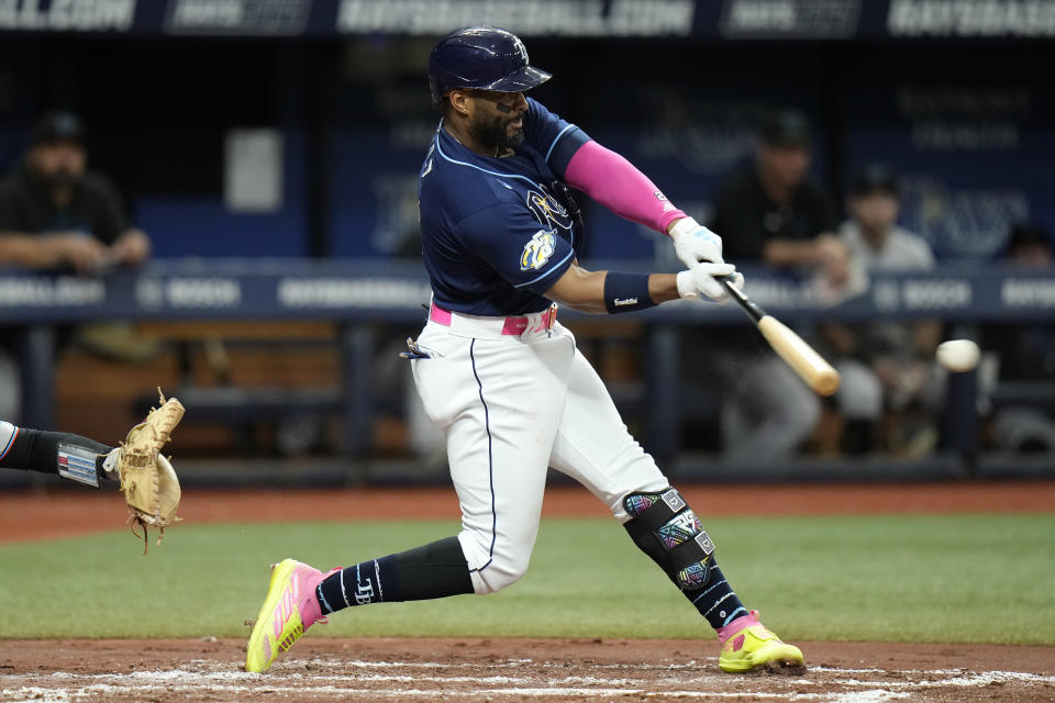 Tampa Bay Rays' Yandy Diaz lines a two-run double off Miami Marlins starting pitcher Edward Cabrera during the second inning of a baseball game Tuesday, July 25, 2023, in St. Petersburg, Fla. (AP Photo/Chris O'Meara)