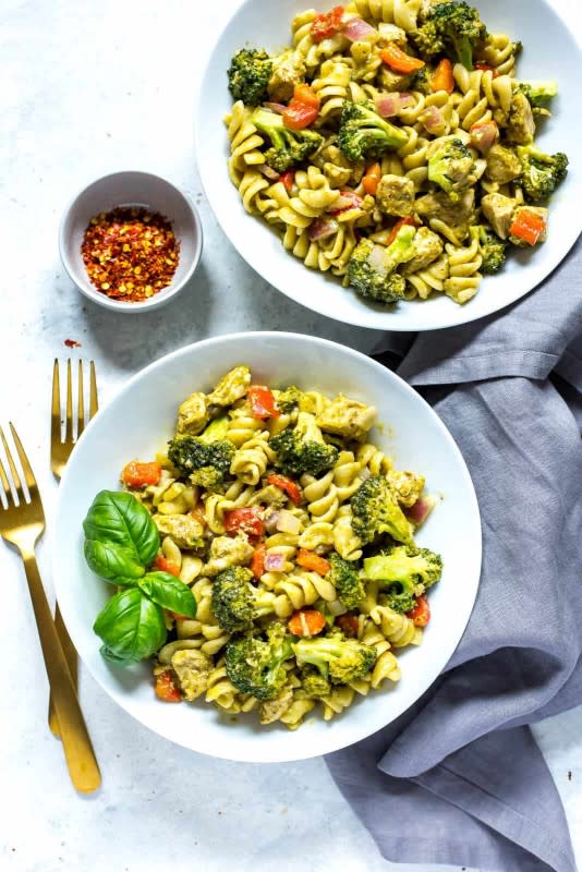 <p>Eating Instantly</p><p>This Instant Pot chicken pesto pasta is a delicious one-pot dinner idea that comes together super easily in the pressure cooker. And, using store-bought pesto it’s ready in just 30 minutes too!</p><p><strong>Get the recipe: <a href="https://eatinginstantly.com/instant-pot-chicken-pesto-pasta/" rel="nofollow noopener" target="_blank" data-ylk="slk:Instant Pot Chicken Pesto Pasta;elm:context_link;itc:0;sec:content-canvas" class="link ">Instant Pot Chicken Pesto Pasta</a></strong></p><p><strong>Related: <a href="https://parade.com/1212628/felicialim/ninja-foodi-chicken-recipes/" rel="nofollow noopener" target="_blank" data-ylk="slk:49 Best Ninja Foodi Chicken Recipes;elm:context_link;itc:0;sec:content-canvas" class="link ">49 Best Ninja Foodi Chicken Recipes</a></strong></p>