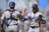 Los Angeles Dodgers catcher Will Smith, left, celebrates with pitcher Craig Kimbrel (46) after the Dodgers defeated the San Francisco Giants in a baseball game in San Francisco, Thursday, Aug. 4, 2022. (AP Photo/Jeff Chiu)