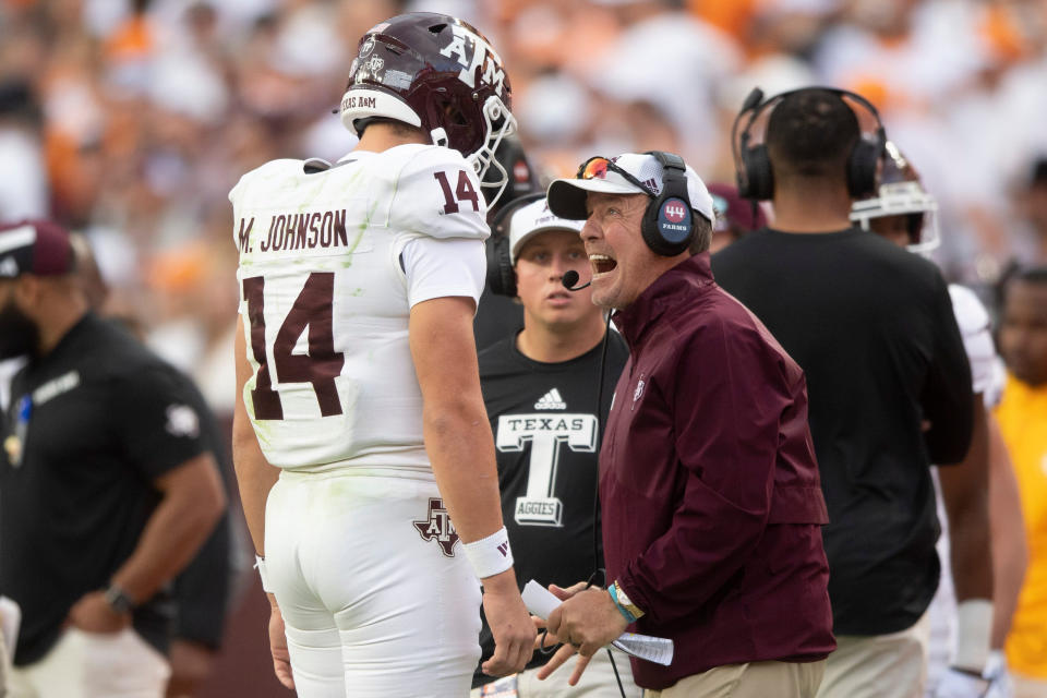 Oct 14, 2023; Knoxville, TN; Texas A&M quarterback Max Johnson (14) talks with Texas A&M head coach Jimbo Fisher during a football game between Tennessee and Texas A&M at Neyland Stadium in Knoxville, Tenn., on Saturday, Oct. 14, 2023. Brianna Paciorka-USA TODAY Sports