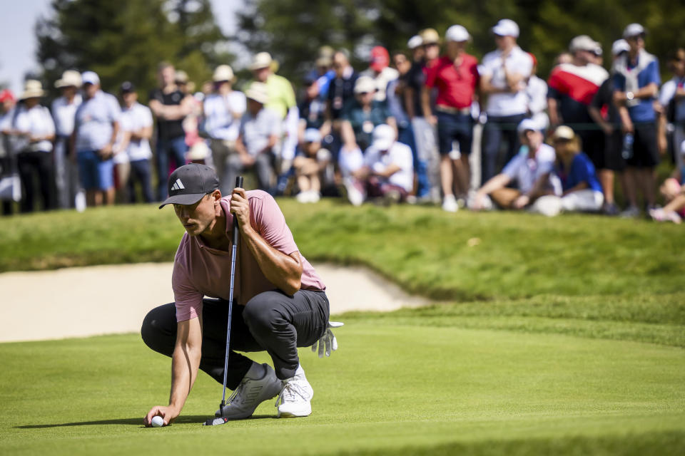 Ludvig Aberg of Sweden gestures, during the fourth and final round of the European Masters Golf Tournament DP World Tour, in Crans-Montana, Switzerland, Sunday, Sept. 3, 2023. (Jean-Christophe Bott/Keystone via AP)