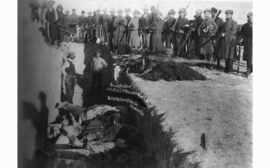 Burying the dead in a common grave at Wounded Knee, S.D. in the aftermath of the Dec. 29, 1890 battle. (Library of Congress)