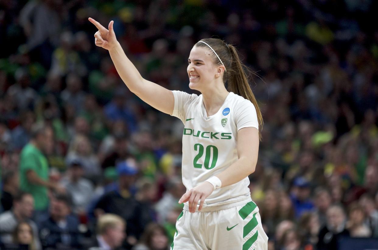Oregon guard Sabrina Ionescu gestures toward the bench during the second half of the team's regional semifinal against South Dakota State in the NCAA women's college basketball tournament Friday, March 29, 2019, in Portland, Ore. Oregon won 63-53. (AP Photo/Craig Mitchelldyer)
