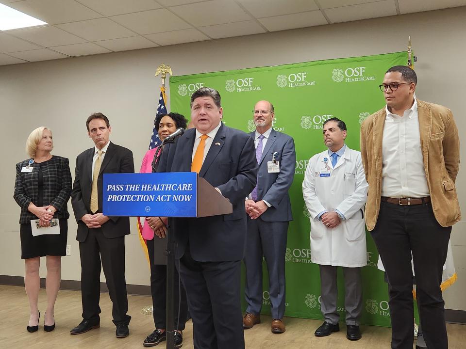 Illinois Gov. JB Pritzker and Lt. Gov. Juliana Stratton join healthcare professionals and state legislators at OSF Saint Anthony Medical Center in Rockford on Tuesday, April 29, 2024, as they campaign for the Healthcare Reform Act.