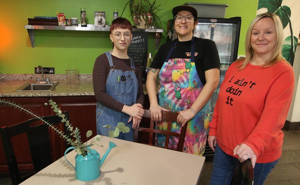 Marah Wehler, owner Sasha Quinn and Neena Moore pose together inside Soul Miner’s Garden Market on Union Road Thursday morning, Jan. 19, 2023.