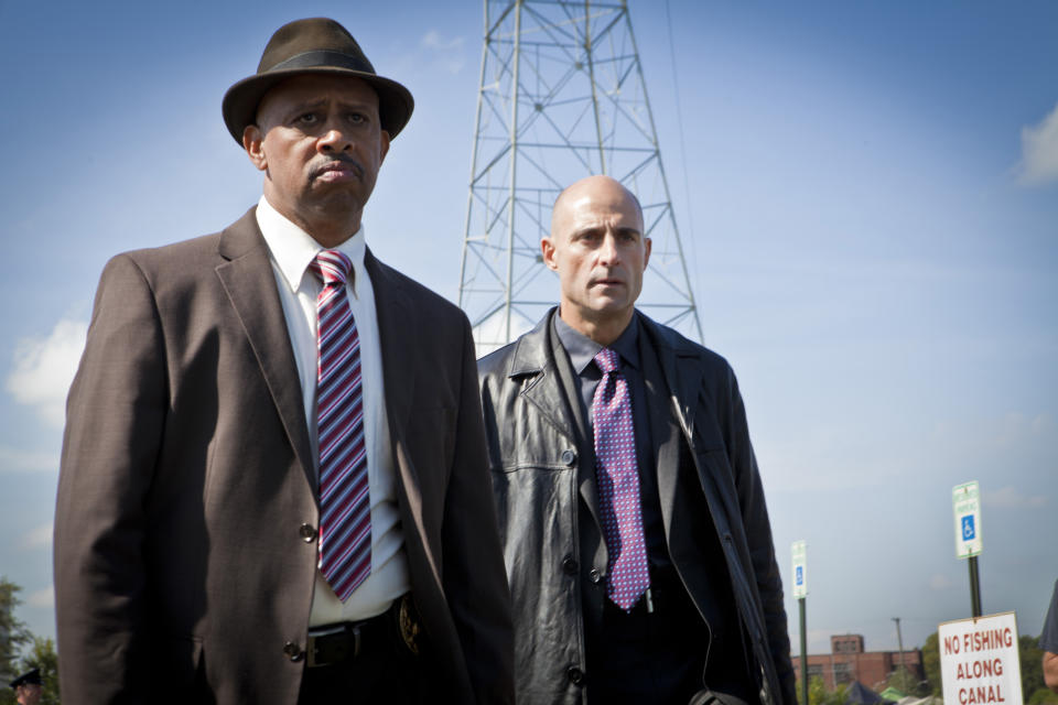 This publicity image released by AMC shows, Ruben Santiago-Hudson as Lt. Charles Dawson, left, and Mark Strong as Frank Agnew from the series "Low Winter Sun," premiering Aug. 11, 2013. (AP Photo/AMC, Alicia Gbur)