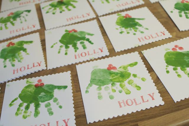 <p>Got a tiny one? Their adorable little hands make a cute "stamped" holly-like shape that everyone will cherish for years. </p><p><em><a href="http://learninglessonsinmummyography.blogspot.co.uk/2012/12/homemade-christmas-card-handprint.html" rel="nofollow noopener" target="_blank" data-ylk="slk:See more at Learning Lessons In Mommyography »;elm:context_link;itc:0;sec:content-canvas" class="link ">See more at Learning Lessons In Mommyography »</a></em><br></p>