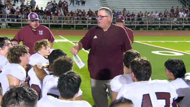 PHOTO: Head coach Wade Miller speaks to the Uvalde High School football team after a game in Uvalde, Texas. (ABC News)