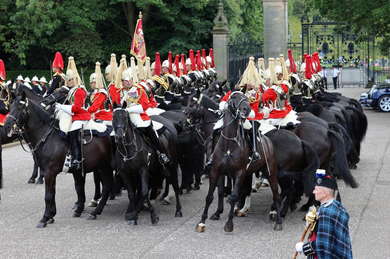 A Household Cavalry horse rears up at the Palace of Holyroodhouse, Edinburgh, after the National Service of Thanksgiving and Dedication for King Charles II (via REUTERS)