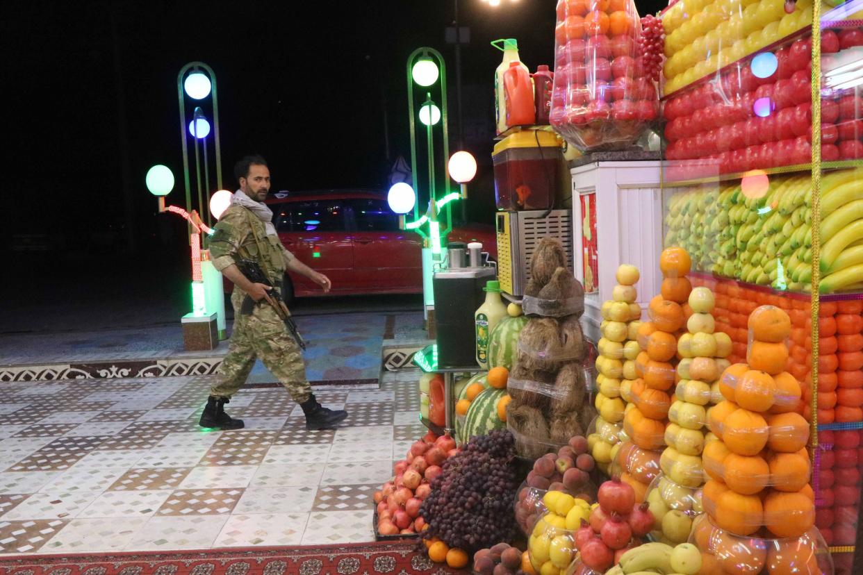 An Afghan security official patrols after Afghan authorities imposed a night curfew in 31 of the 34 provinces in Afghanistan, in Herat, Afghanistan, 28 July 2021 (EPA)