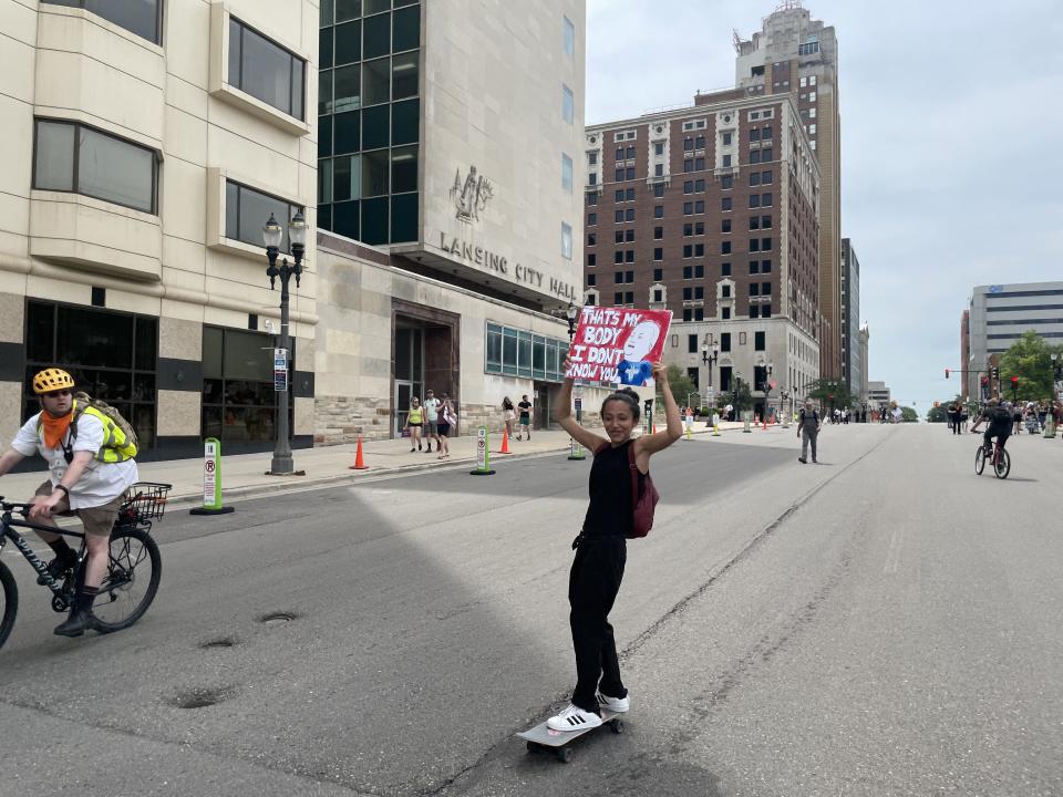 Abortion rights protesters walked from the state Capitol lawn and into Lansing's July 4 parade July 4, 2022.