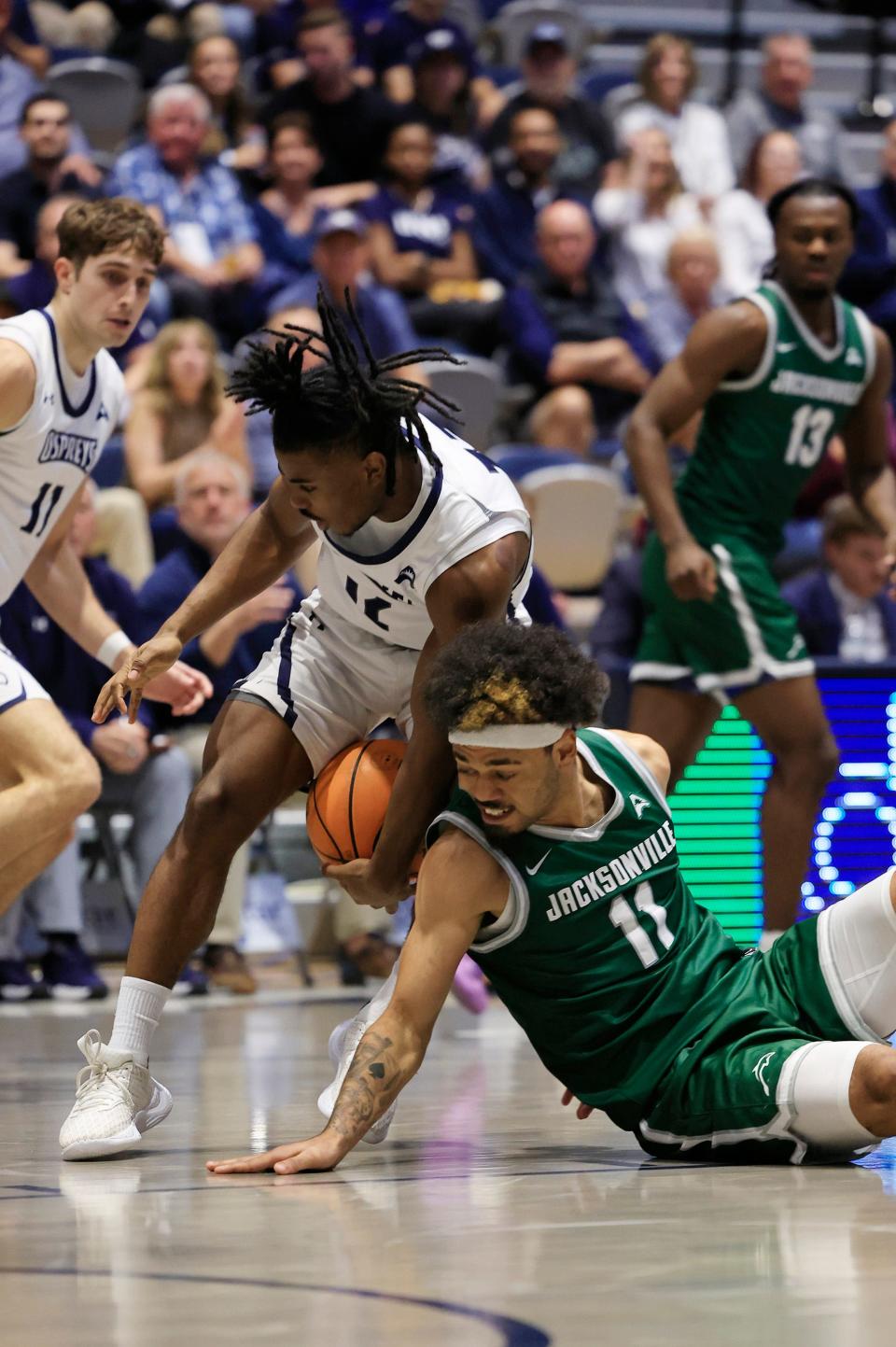 University of North Florida freshman point guard Jaylen Smith (12), coming up with a loose ball against Jacksonville on Jan. 12, has 18 assists and five turnovers in four games since taking over for the injured Ametri Moss.