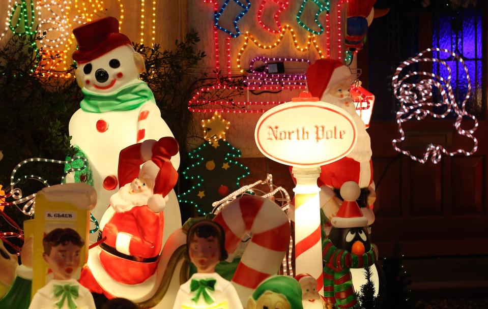 Homeowners Decorate Their Houses For Christmas