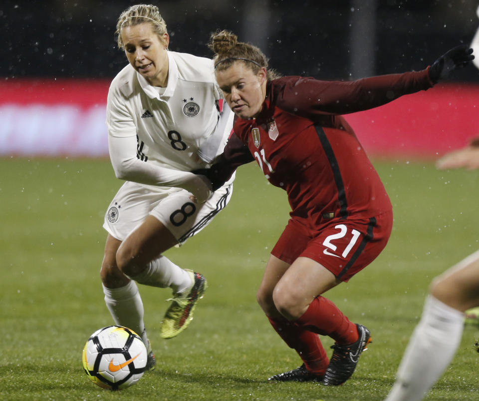 FILE - In this March 1, 2018, file photo, Germany's Lena Goessling, left, and United States' Savannah McCaskill chase the ball during the second half of a SheBelieves Cup women's soccer match in Columbus, Ohio. McCaskill was chosen second overall in 2018 National Women’s Soccer League (NWSL) draft, sending her to the Boston Breakers, a team that folded in late January when a potential new ownership deal fell through. (AP Photo/Jay LaPrete, File)