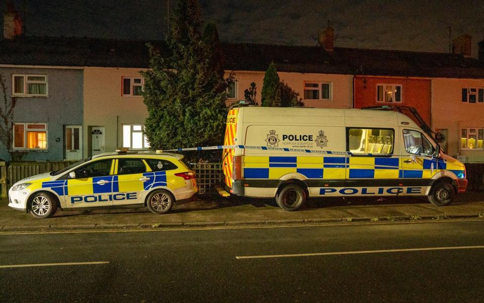 Police outside the home of Olubunmi Abodunde in Newmarket, Suffolk, after the he had murdered his wife, Taiwo