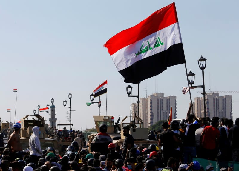 FILE PHOTO: Iraqi demonstrators take part in one of the ongoing anti-government protests in Baghdad