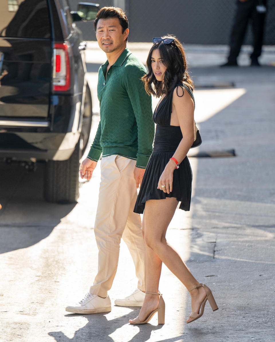 <p>Simu Liu makes his way into <em>Jimmy Kimmel Live! </em>in L.A. on June 28.</p>