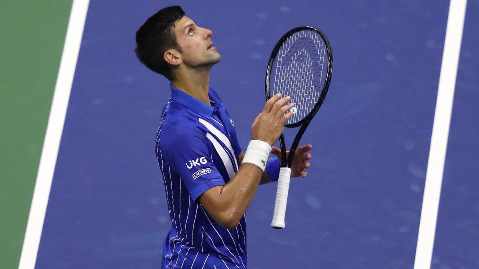 Novak Djokovic is pictured celebrating after his first round US Open victory.